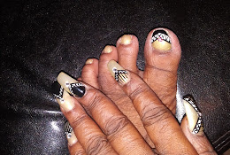 T J Nails